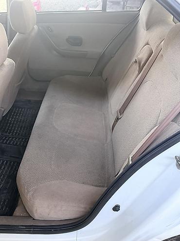 islenmis hyundai avtomobilleri satisi: Khazar LX sedan - Kuzov: ağ rəng, 4 qapılı sedan - Komplektasiya: LX — 6