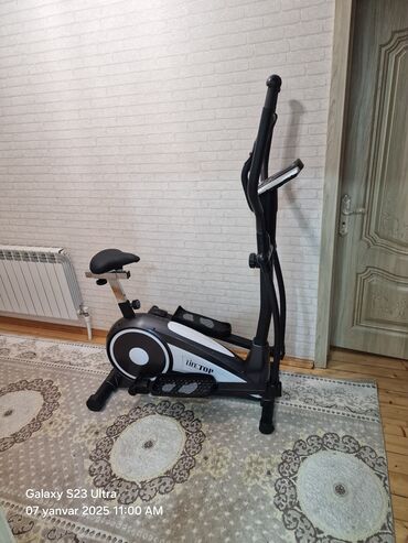 Velotrenajorlar: Toy Top firmasının elliptik trenajoru. Evdə idman etmək üçün