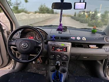 мата секыл: Mazda 2: 2003 г., 1.3 л, Кол менен иштөөчү, Бензин, Хетчбек — 4