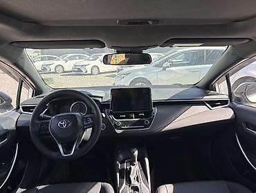 Toyota Corolla: 2019 г., 1.8 л, Автомат, Гибрид, Седан