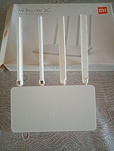 wifi elaqe nomresi: Xiaomi Mi Router Wi‑Fi router. az islenib 4G Ağ rəngi, yığcam və — 1