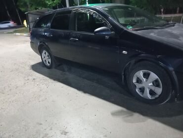 Nissan: Nissan Primera: 2002 г., 1.8 л, Механика, Бензин, Универсал