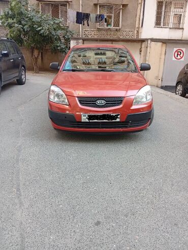 Kia Rio: 1.4 l | 2006 il Hetçbek