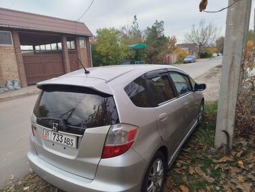 Honda: Honda Fit: 2011 г., 1.5 л, Автомат, Газ, Седан