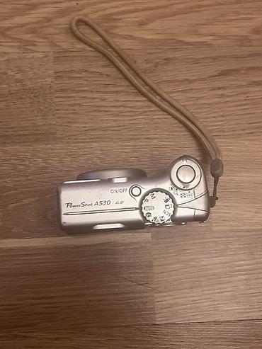 data nomre: Canon PowerShot A530 rəqəmsal fotoaparat. Kompakt gövdəyə malik bu — 1