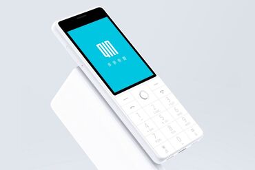мини стиралька: Кнопочный телефон Qin 1s+ (белый) - Лаконичный моноблок с физической