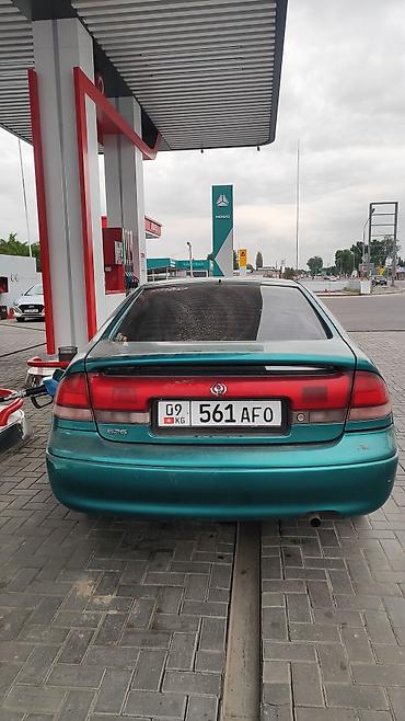 android avto: Mazda Cronos: 1996 г., 1.8 л, Механика, Бензин, Хэтчбэк — 6