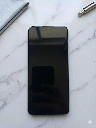 iphone x barter: Məhsul: Redmi smartfon Xüsusiyyətlər: - Rəng: Açıq mavi arxa panel — 2