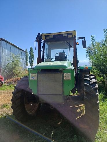 Другие тракторы: Колёсный трактор с кабиной Основные характеристики: - Полностью — 8