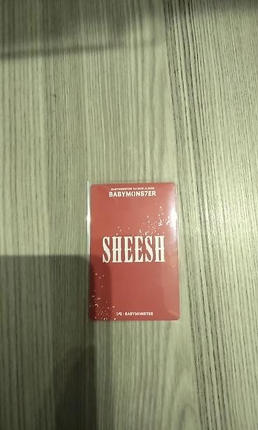 pişik şekli cekmek: Məhsul: BABYMONSTER “SHEESH” fotokart – Ahyeon versiyası Təsvir: - — 2