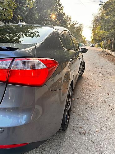 tesla model s: Kia Cerato: 1.6 l | 2014 il Sedan — 5