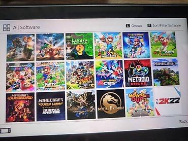 Nintendo Switch: 🔥 JEDINSTVENA PONUDA! Prodajem Nintendo Switch 32GB + microSD 400GB — 8