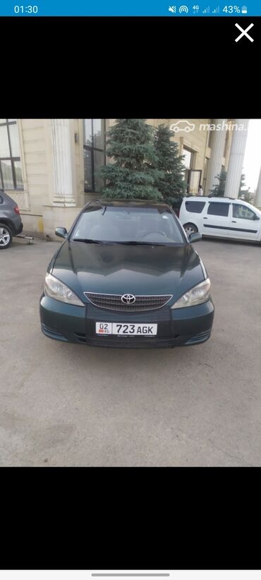 авто продаю срочно: Автомобиль Toyota Camry, седан, темно-зеленого цвета. Оснащен