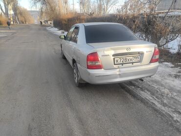 авто запчаст кудайберген: Mazda 323: 2001 г., 1.5 л, Автомат, Бензин, Седан