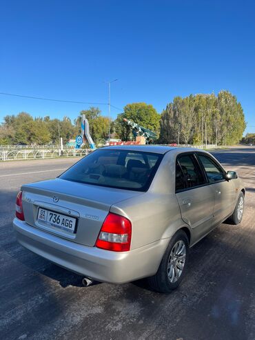 Mazda: Mazda 323: 2001 г., 1.6 л, Механика, Бензин, Седан