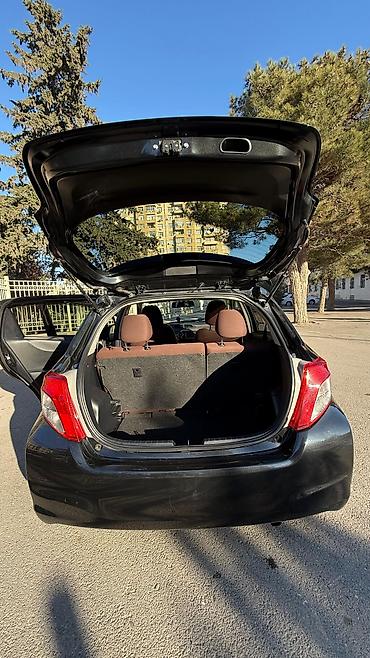 bort baqaj: Toyota Vitz (Yaris) hatchback - Kuzov: 5 qapılı, qara rəng - — 6