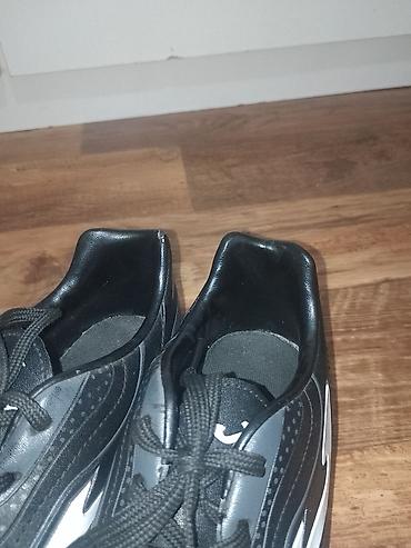 Kopačke: Kopačke Joma Aguila – crno‑bele - Model: Joma Aguila (logo i natpis — 8