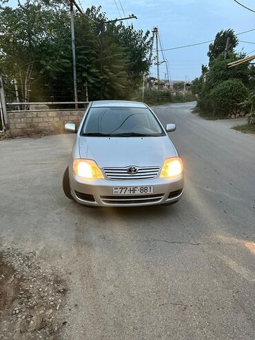 Qaşıqlar: Toyota Corolla: 1.4 l | 2006 il Sedan