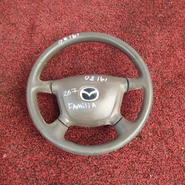 Другие автозапчасти: Руль Mazda Familia 8 ПОКЛЕНИЕ 1500 ZL-DE 1999 (б/у) САЛОННЫЕ ДЕТАЛИ - at lalafo.kg Другие автозапчасти: Руль Mazda Familia 8 ПОКЛЕНИЕ 1500 ZL-DE 1999 (б/у) САЛОННЫЕ ДЕТАЛИ -