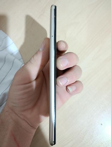 redmi not 6: Xiaomi Mi 2A, 64 GB, rəng - Qızılı, 
 Düyməli, Barmaq izi, İki sim kartlı — 5