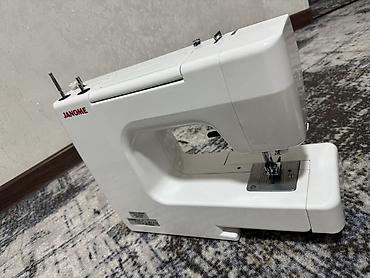 рукавная: Бытовая швейная машинка JANOME. Описание: - Универсальная — 2