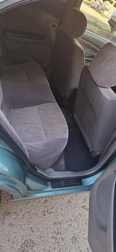 megane disk: Nissan Sunny EX Saloon sedan - Kuzov: 4 qapılı sedan, mavi/yaşıl rəng — 6