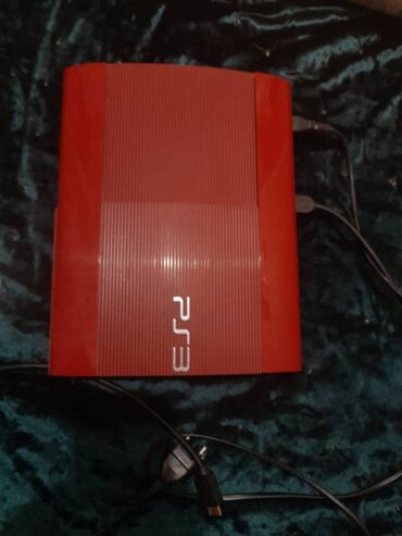 Opel: Sony playstation 3 super slim 500GB. Rengi qirmizidir. Konsol sadece