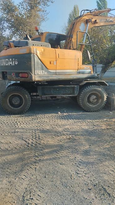хово тх 7v: Экскаватор, Hyundai, Колесный — 3