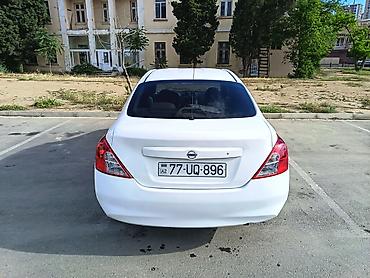 tesla model s: Nissan Sunny: 1.5 l | 2014 il Sedan — 3