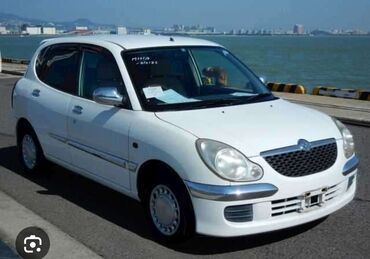 Toyota: Toyota Дуэт: 2002 г., 0.1 л, Механика, Бензин, Хэтчбэк