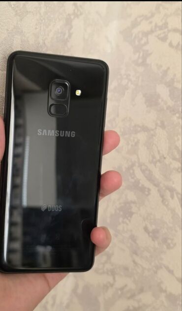 Pontiac: Samsung Galaxy A8 2018, 64 ГБ, цвет - Черный, Две SIM карты