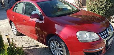jetta fara: Volkswagen Jetta: 1.6 l | 2009 il Sedan — 5
