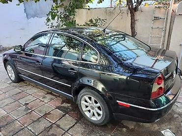 passat 2004: Volkswagen Passat (sedan), qara rəng. - Korpus: 4 qapılı, xrom yan — 2