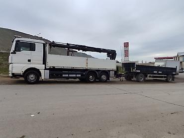 tatra 815: Yükdaşıma xidməti – bortlu kranmaşın və qoşqu - Avtomobil: MAN TGA — 2