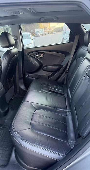 e60 guzgu: Hyundai ix35 Limited 4WD – gümüş rəngli şəhər/krosover. Texniki və — 6