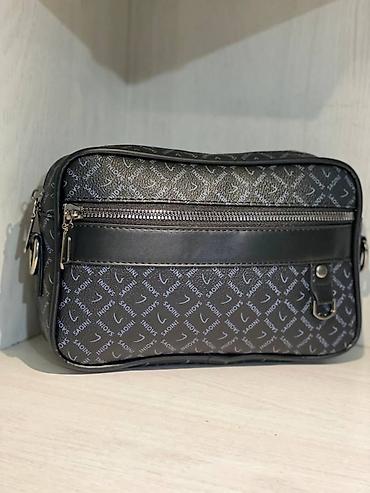 Другая мужская одежда: Цена: 1390 сом (небольшой торг) Новая мужская барсетка, удобная и — 2