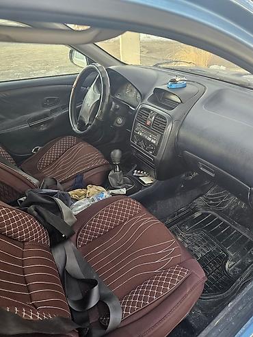 mitsubishi lancer evolution: Mitsubishi Carisma: 2001 г., Седан — 7