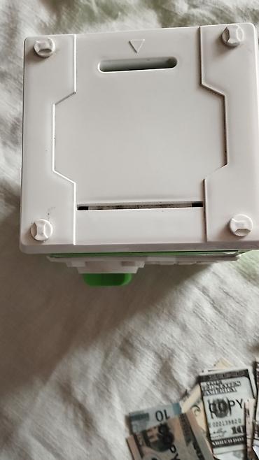 автомобильный набор: Uşaq üçün elektron pul qutusu – Ben 10 temalı - Rəng: yaşıl-ağ - Ön — 2