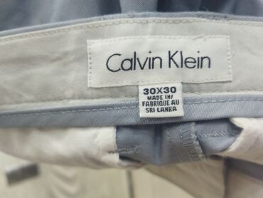 klassik kişi cemperləri: Şalvarlar Calvin Klein