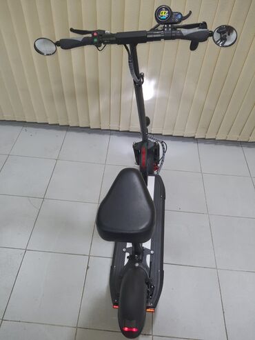 купить электросамокат: Elektrikli skuter – oturacaqlı, güclü və tam təchizatlı model