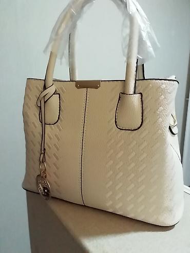 caprice koferi: Nova prelepa bež tašna dužine 30cm i visine 22cm. 3 pregrade unutra — 4