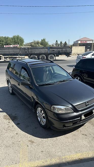 Opel: Opel Astra: 2 l | 1998 il 437586 km Universal — 12