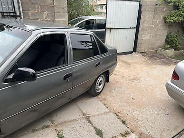 Daewoo Nexia: 2011 г., 1.6 л, Кол менен иштөөчү, Бензин, Седан — 4