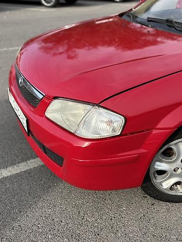 Mazda: Mazda 323: 1998 г., 1.5 л, Механика, Бензин, Универсал — 15