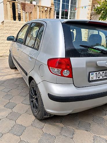 porsche satisi: Hyundai Getz, 5 qapılı şəhər hetçbeki Xarici görünüş: - Gümüşü rəngdə — 2
