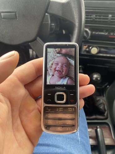 islenmis ucuz telefonlar: Nokia 6700 Slide, rəng - Gümüşü