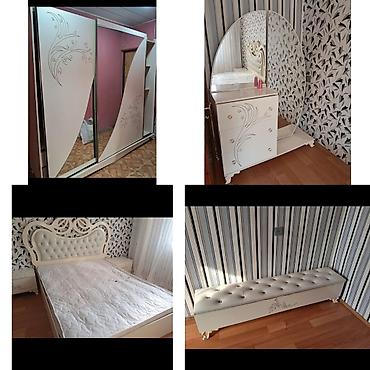 komod mebel: Yataq dəsti – 300 AZN Tərkibi: - 2 qapılı sürgülü şkaf: iri güzgü — 1