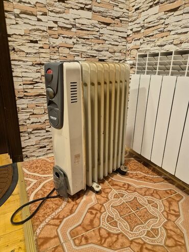 radiator işlənmiş: Обогреватели и камины