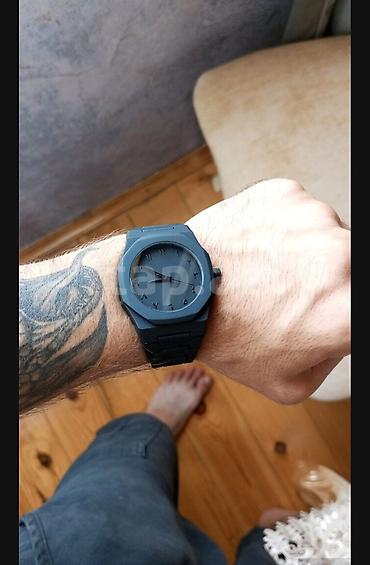qol saatı tissot: Minimalist dizayna malik kişi qol saatı - Rəng: tam qara (mat) - — 1