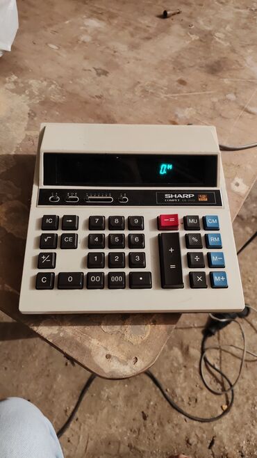 Foto və videokameralar: Yapon istehsalı olan SHARP kalkulyator. 1987-ci il istehsalı. 220V